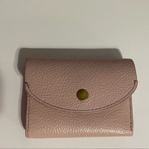 Small light pink fossil wallet